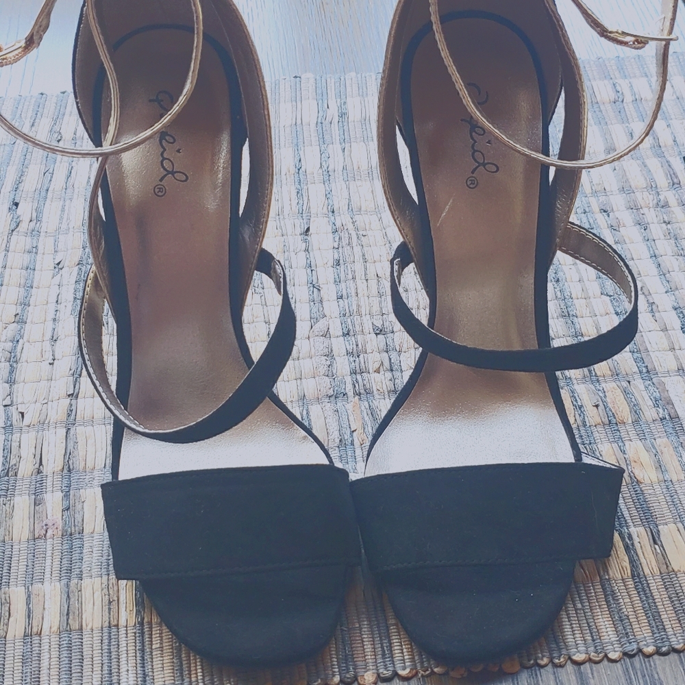 Strappy black and gold heels